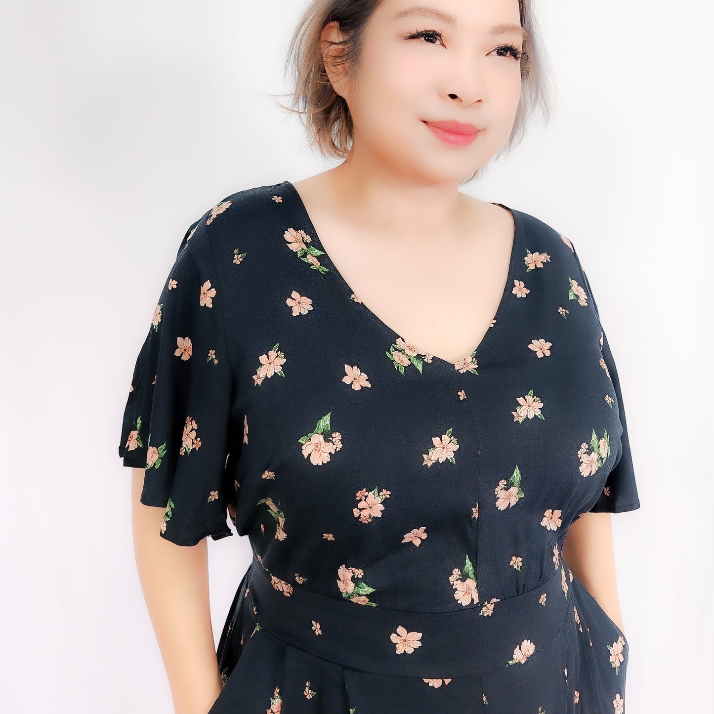Plus Size Black Romper with Flora Details