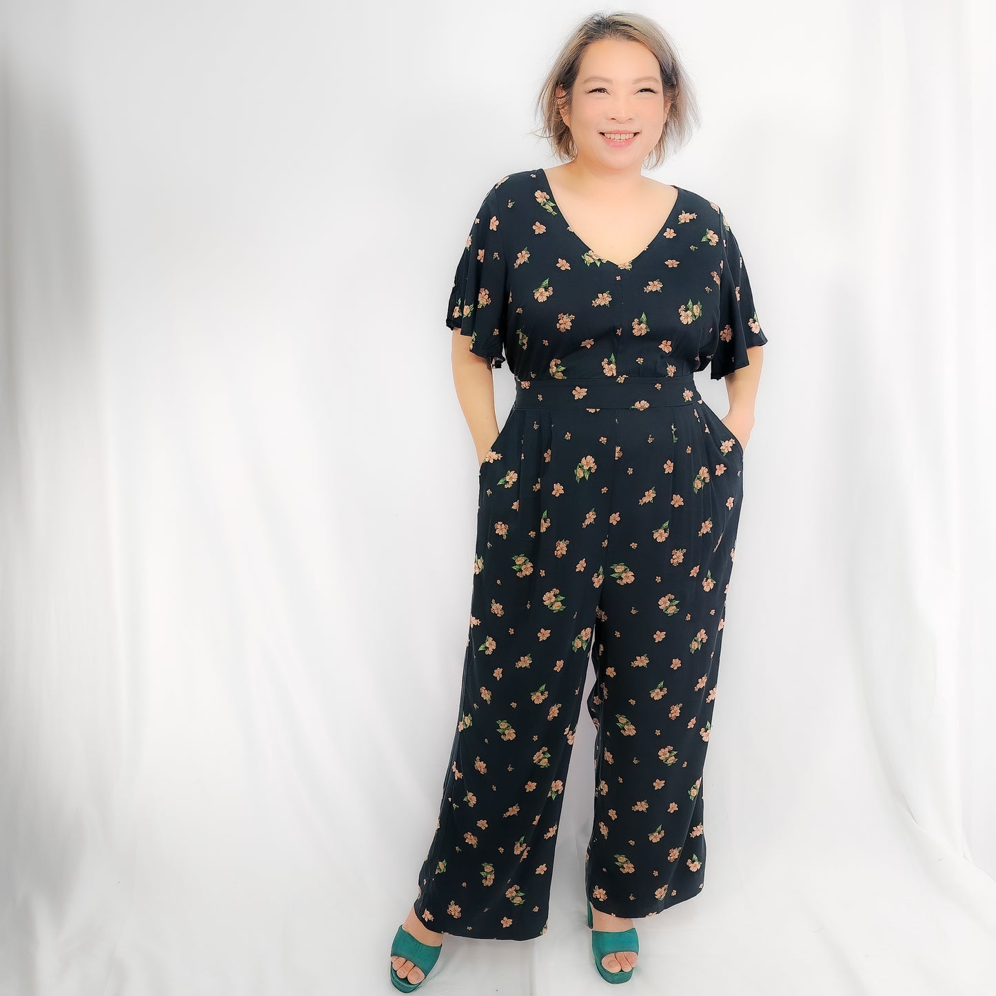 Plus Size Black Romper with Flora Details